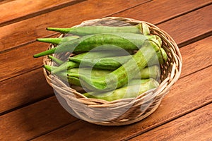 Brazilian Okra into a Basket