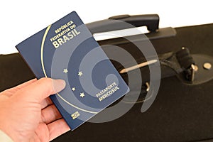 Brazilian passport being prepared for travel.