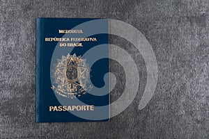 Brazilian passport on gray background with copy space