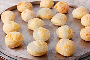 Brazilian snack cheese bread pao de queijo on oven-tray photo