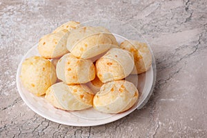 Brazilian snack cheese bread (pao de queijo) on plate