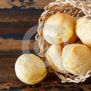Brazilian snack cheese bread (pao de queijo) in wicker basket
