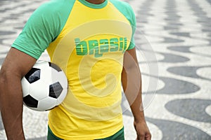 Brazilian Soccer Player in Brasil Shirt Holding Football Rio