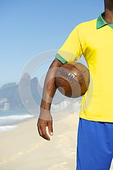 Brazilian Soccer Player Holding Football Rio
