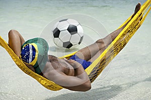 Brazilian Soccer Player Relaxing in Beach Hammock