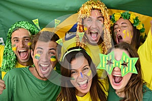 Brazilian sport soccer fans celebrating victory together.