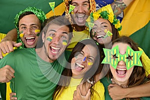 Brazilian sport soccer fans celebrating victory together.