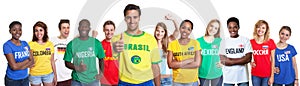 Brazilian sports fan showing thumb with 11 international fans