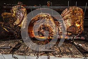 Brazilian style beef ribs Barbecue grill on skewers  at a churrascaria steakhouse photo