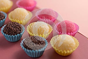 Brigadeiro, Beijinho and Bicho de Pe: sweets from Brazil. Child photo