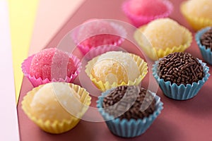 Brigadeiro, Beijinho and Bicho de Pe: sweets from Brazil. Child photo