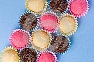 Brigadeiro, Beijinho and Bicho de Pe: sweets from Brazil. Child b photo