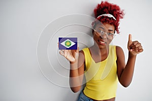 Brazilian woman with afro hair hold Mato Grosso flag isolated on white background, show thumb up. States of Brazil concept