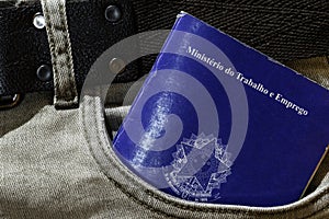 Brazilian work card inside worker jeans pocket photo