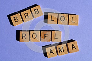 BRB, LOL, ROFL, AMA, acronyms used in social media internet slang photo