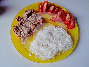 Breackfast on yellow plate