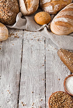 Bread background on rustic wood