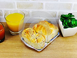 Bread with bacon ham pork mayonnaise and fruit juice