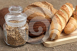 Bread, baguette and pot with grains