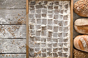 Bread bakery background. Brown and white wheat grain loaves, checkered pattern