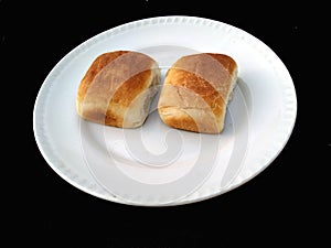 Bread, bakery icon, sliced fresh wheat bread isolated on black background