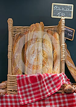 Bread and basketful to bread from the baker