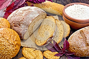 Bread and biscuits amaranth with flour and flower on board