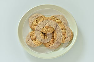 Bread Biscuits with Cashew Nuts on dish on white background