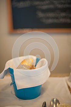 Bread in a blue bucket