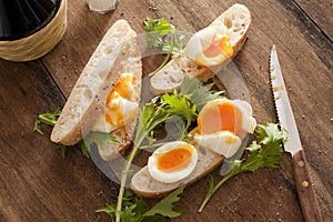 Bread with boiled eggs and salad