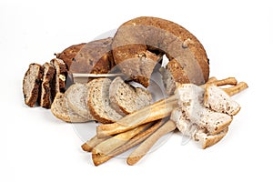 Bread and breadsticks isolated on white background