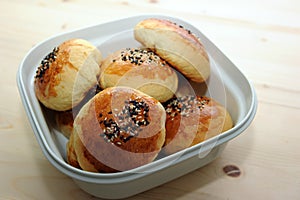 Bread bun in container