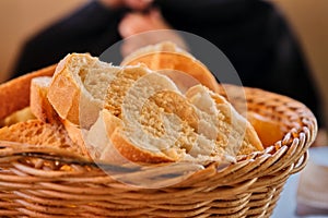 Bread and buns on a wooden table, selective focus photo