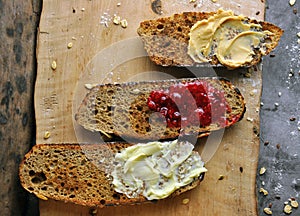 Bread with butter, jam and peanut butter