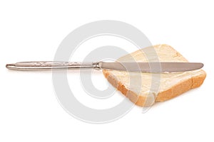Bread with butter knife in hand
