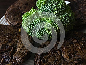 Bread cakes with broccoli on a plate