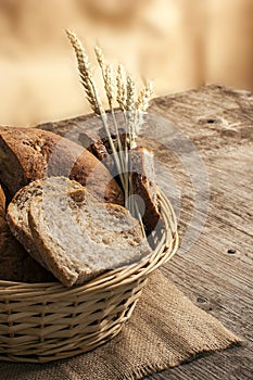 Bread and cereals on wooden vintage background