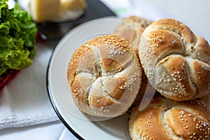 Bread with cheese, lettuce and cakes photo
