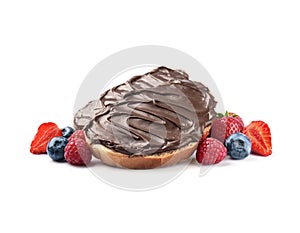 Bread with chocolate paste with berries on white backgrounds