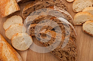 Bread chopped on wooden board with space for text