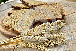 Bread with corn on a wooden table