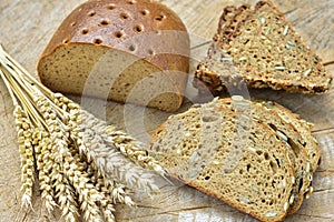 Bread with corn on a wooden table