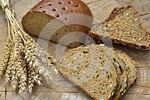 Bread with corn on a wooden table