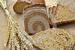 Bread with corn on a wooden table