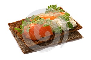 Bread crisp with salmon, soft cheese and chervil