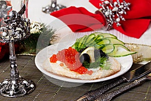 Bread, crispy tortilla with black and red caviar Christmas meal New Year