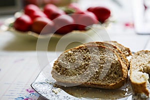 Bread cut slices and red eggs