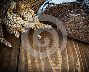 Bread and ears on the oak table