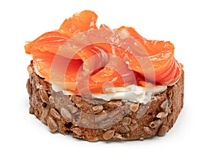 bread with fresh salmon fillet and cream cheese isolated on white background. clipping path
