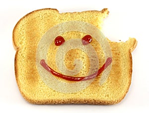 Bread with happy face and bite